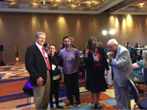 Dr. Mitakides and Dr. Rodney Grahame talking with conference attendees in between their sessions.